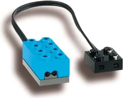 A blue and gray LEGO light sensor with a black wire connected to a black LEGO brick.