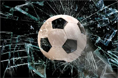Produktbild von Wallario Poster - Fußball - im Fenster, Splitter und Glas, Kunstdruck Größe: 100 x 150 cm