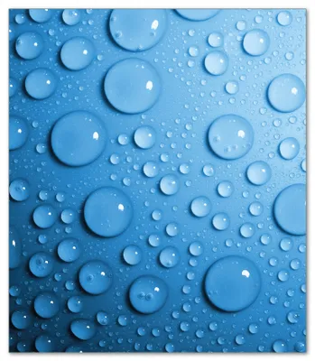 Produktbild von Wallario Herdabdeckplatte aus Glas, Größe 52 x 60 cm 1-teilig, Motiv Wassertropfen auf Blau