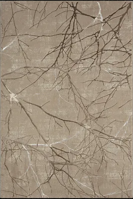 A close-up view of a rug with a pattern of tree branches.