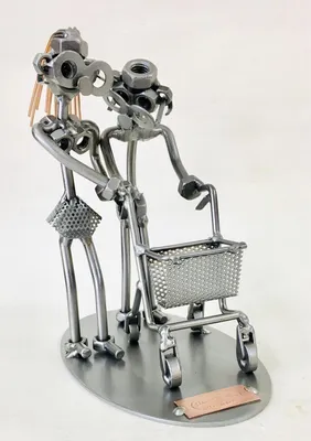 Image de Figurine en métal « Soins aux personnes âgées » – Petit bonhomme en vis, décoration pour les métiers du secteur des soins