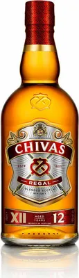 A bottle of Chivas Regal 12 Year Old Blended Scotch Whisky.