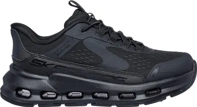 A black Skechers slip-on shoe is shown from the side against a white background.