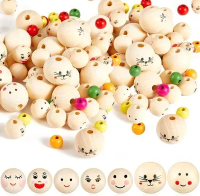 Image de Perles en bois colorées de 12 à 30 mm avec des visages et du fil métallique
