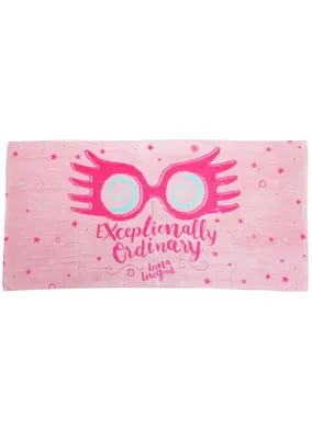 A pink towel with Luna Lovegood's glasses and text printed on it.