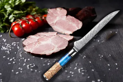 Immagine prodotto di Un coltello per disossare non solo bello, ma anche estremamente affilato. Coltello per disossare Coltello per sfilettare Acciaio Damasco Unico manico in legno