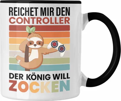 Produktbild von Trendation - Zocken Reichet Mir den Controller König Tasse Geschenk Gamer Jungs Jungen Geschenkidee Zocker Faultier Grafik (Schwarz)