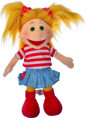 A stuffed doll with blonde hair in pigtails, wearing a striped shirt and a floral skirt.