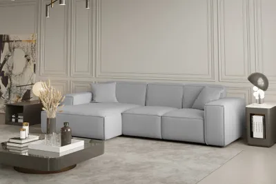 Produktbild von Ecksofa Designersofa CELES in Stoff Opera Velvet Hellgrau Ottomane Links