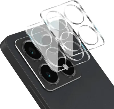 A close-up of a smartphone camera lens protector being placed onto a smartphone.