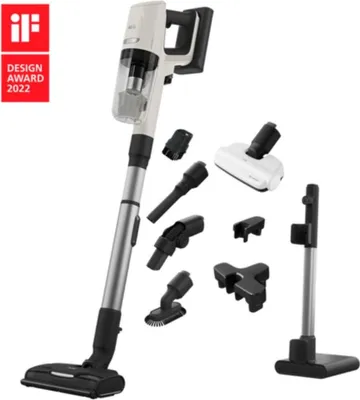 A cordless vacuum cleaner with multiple attachments and a charging stand, presented against a white background.