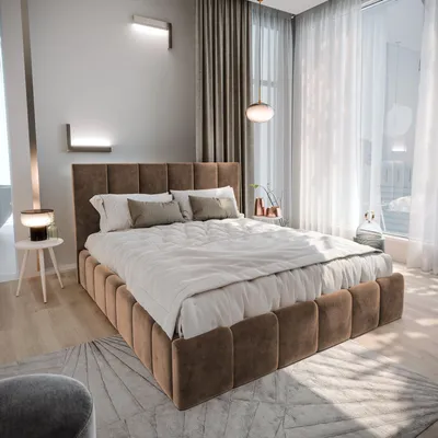 A modern bedroom with a large upholstered bed as the focal point.