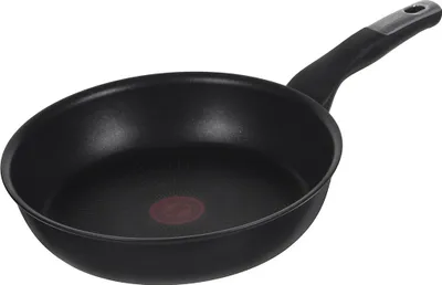 A black frying pan with a black handle is shown against a white background.