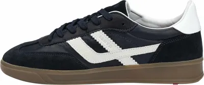 A side view of a single blue sneaker.
