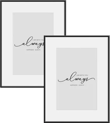 Two black metal picture frames with white mats and printed text on a white background.