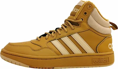 A side view of a single brown Adidas high-top sneaker with cream accents.