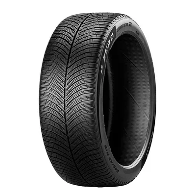 A studio shot of a single car tire against a white background.