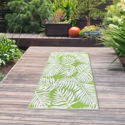 Produktbild von Outdoor-Teppich in Palmenblattmuster in grün Größe - 90 x 150 cm