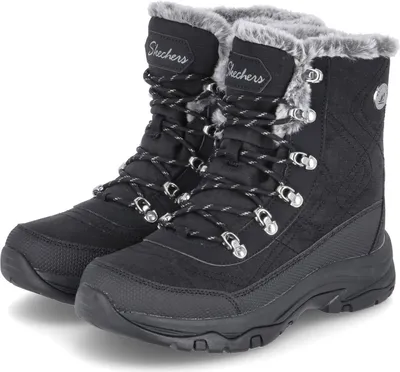 A pair of black Skechers winter boots with gray faux fur trim and white laces.