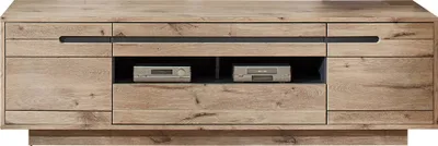 A front view of a wooden TV lowboard with two open compartments in the center, each containing an electronic device.