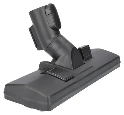 A black vacuum cleaner floor nozzle is shown against a white background.