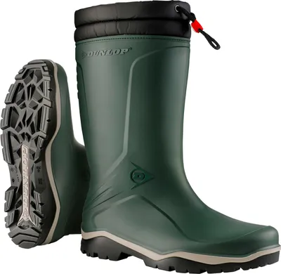 A pair of green Dunlop winter boots shown against a white background. One boot is standing upright, and the other is lying on its side, showing the sole.