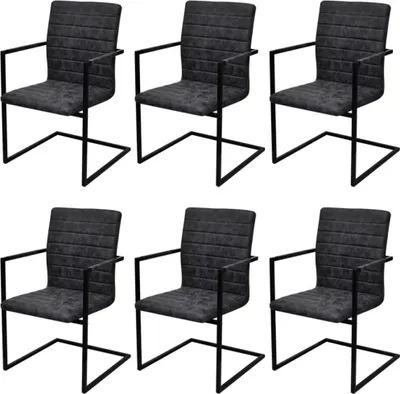 Six black faux leather dining chairs with black metal frames are arranged in two rows of three against a white background.