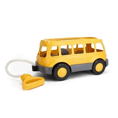 Image de Jouets verts tirant un bus scolaire