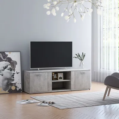 A modern living room with a TV and entertainment unit.