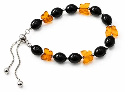 Productafbeelding van BEYSTON Barnsteen armband met ovale kralen, AI-gegenereerde afbeelding