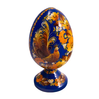 Produktbild von Dekoratives, handbemaltes Osterei (Pysanka) aus Holz auf einem Ständer mit origineller Petrykiwka-Malerei, blau