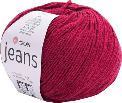 A ball of red yarn with a white label.