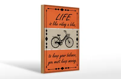 Produktbild von Holzschild Spruch 20x30cm Life is like riding a bike