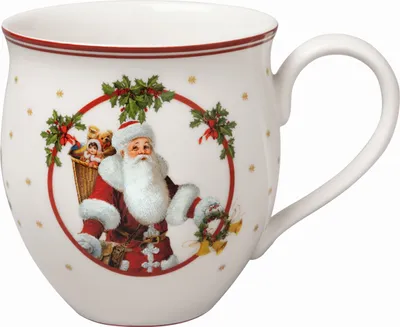 A white ceramic mug with a Christmas-themed design featuring Santa Claus.