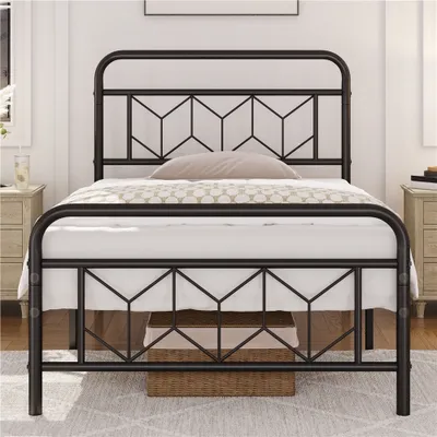 A black metal bed frame with a geometric headboard and footboard, set up in a bedroom with nightstands on either side.