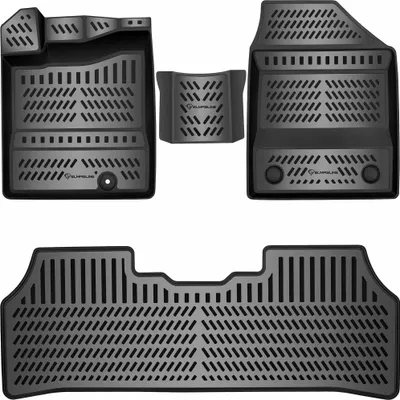 A set of car floor mats arranged on a white background.
