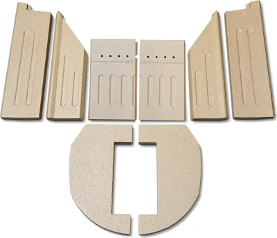 A set of firebricks for a stove, arranged on a white background.