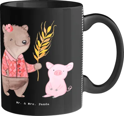 Produktbild von Mr. & Mrs. Panda Kaffeetasse Landwirtin Herz - Schwarz - Geschenk, Tierwirtin, Bauernhof, Tiere, Henkeltasse, Trinkbecher, Bäuerin, Becher, Dekotasse, Schweine, Tasse
