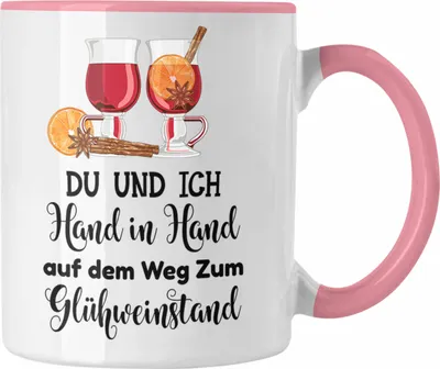 Produktbild von Trendation - Glühwein Tasse Lustig Spruch Glühweinbecher mit Henkel Doppelwandig Glühweintassen Gläser Weihnachtsmarkt Becher Tassen Geschenk - Hand In Hand Zum Glühweinstand (Rosa)