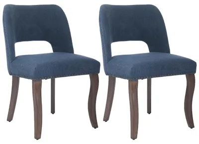 Productafbeelding van Set van twee fluweelzachte eetkamerstoelen met een open rugleuning en poten van rubberhout, blauw
