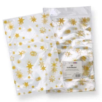 Two clear plastic bags with gold star patterns are shown against a white background. One bag is slightly in front of the other, and the one in the back has a label with product information.