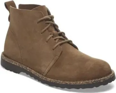 A single brown boot is shown against a white background.