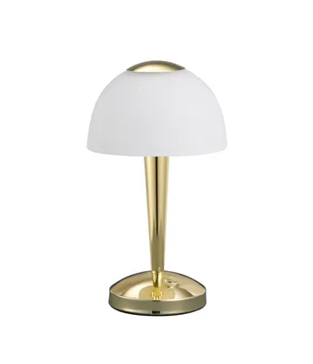 A close-up studio shot of a modern gold and white table lamp.