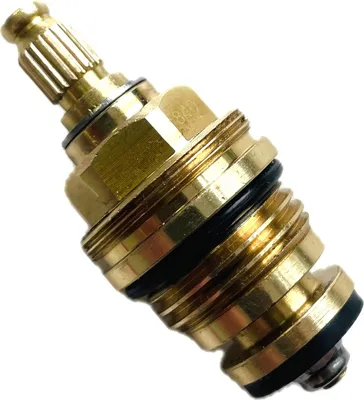 A close-up studio shot of a brass faucet valve stem.