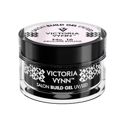 A studio shot of a Victoria Vynn Build Gel UV/LED nail product in a black and clear jar with pink labeling.