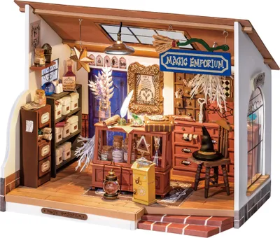A miniature model of a magic shop interior, filled with shelves, display cases, and magical-themed items.