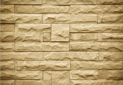 Produktbild von Wallario Fototapete Vliestapete, seidenmatte Oberfläche, einfache Verarbeitung, Größe 200 x 140 cm, Motiv Steinwand gelb