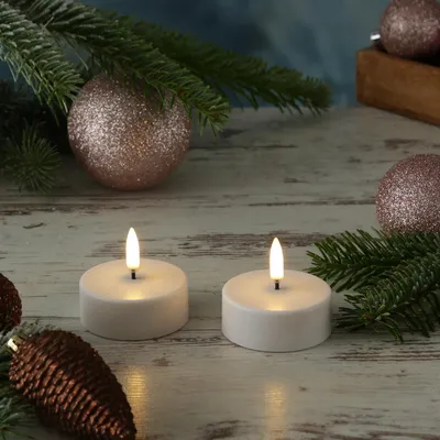 LED Maxi Teelichter - 2 wiederaufladbare LED Teelichter - D: 6cm - Timer - weiß - für Außen