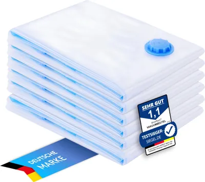 A stack of white vacuum seal bags with blue accents and a blue valve on top.
