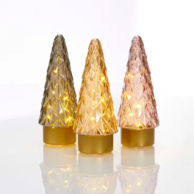 Three decorative glass Christmas trees with LED lights.